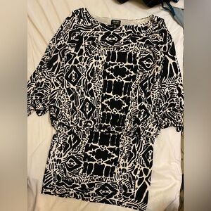 Nicole Miller dress. Flouncy on the top and more fitted in the skirt area